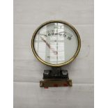 A brass L.T. (London Transport) railway air pressure gauge with fixing bracket