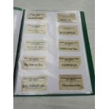 Three folders containing luggage labels of the LMS, GNR,