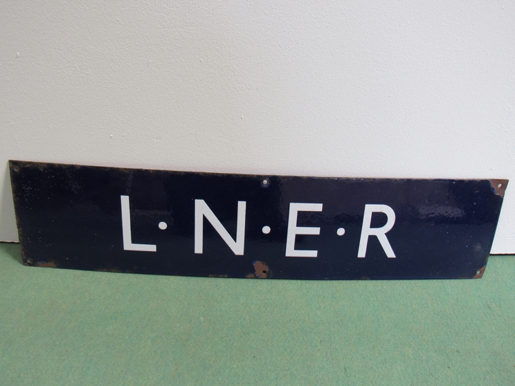 An enamel LNER poster board heading