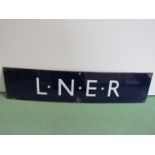 An enamel LNER poster board heading