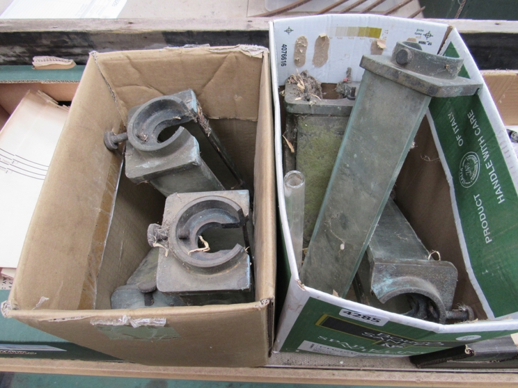 Two boxes containing various gauge glass protectors