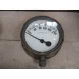 A brass boiler pressure gauge showing up to 200lbs,