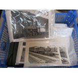 A quantity of black and white photographs of various steam locomotives,