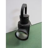 A black painted LMS wartime pattern handlamp, three aspects and bull's eye lens,