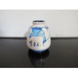 A Moorcroft "Arctic Home" bulbous vase designed by Paul Hilditch. Boxed and sleeved.