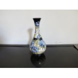 A Moorcroft "Florian Revisited" baluster vase (2nd). Signed NE10. Designed by Rachel Bishop.