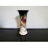 A Moorcroft "Anna Lily" vase designed by Nicola Slaney. Boxed.