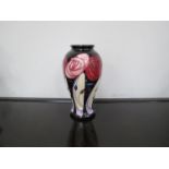 A Moorcroft "Bellahouston" vase. Designed by Emma Bossons. Boxed and sleeved.