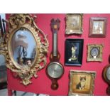 A 19th Century mahogany and shell motif inlaid 8" wheel barometer with long moulded thermometer box,