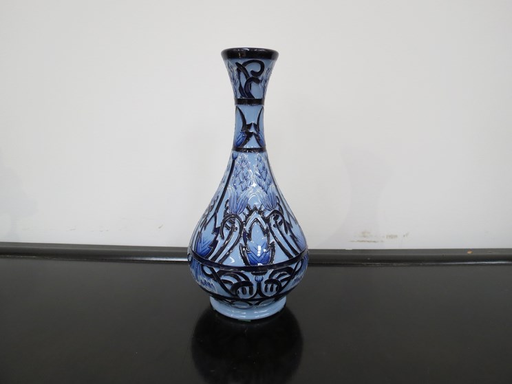 A Moorcroft "Patterns in Blue" vase signed LE 11/25. Designed by Paul Hilditch. Boxed.