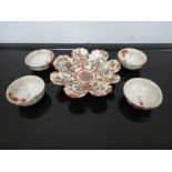 A Japanese china set of four pourers with orange floral design and a Japanese plate with butterfly