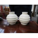 A pair of Wedgwood white ground Keith Murray moonstone bulbous vases,