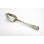 A Georgian silver serving spoon, monogrammed handle, London, 1798,