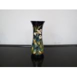 A Moorcroft "Elfin Beck" vase. Signed LE 34/250. Designed by Philip Gibson. Boxed.