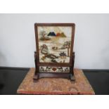 A late 18th/early 19th Century Chinese painted quartz table screen decorated with extensive river