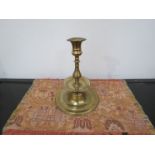 A 19th Century brass candlestick with drip tray,