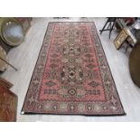 A 20th Century chenille Persian style rug with short pile,