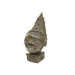 A Benin bronze female bust wearing a woven and beaded conical headdress and similar collar,