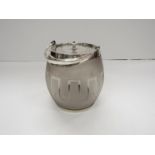 An Edwardian frosted glass biscuit barrel with castellated engraving and silver plated mounts and