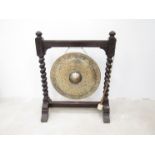 A 19th Century floor standing gong with barleytwist supports,