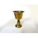 A 19th Century brass chalice shaped vessel 8cm tall,