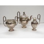 An R & B Victorian electro plated Neoclassical silver three piece tea set with scholar and Roman