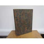 A mottled hard cased folio cover