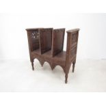 A circa 1900 Anglo Indian carved wood three section Canterbury/stand,