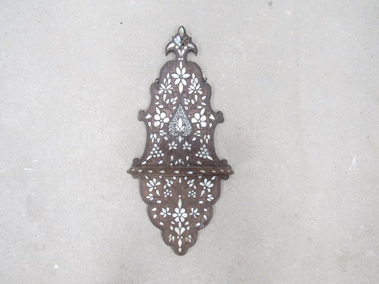 A 19th Century Anglo-Indian shaped wall hanging shelf with inset mother-of-pearl floral detail