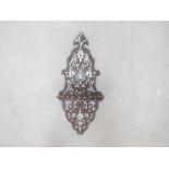 A 19th Century Anglo-Indian shaped wall hanging shelf with inset mother-of-pearl floral detail