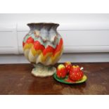 An early/mid 20th Century Czechoslovakian art pottery vase of wrythen-fluted spherical form,