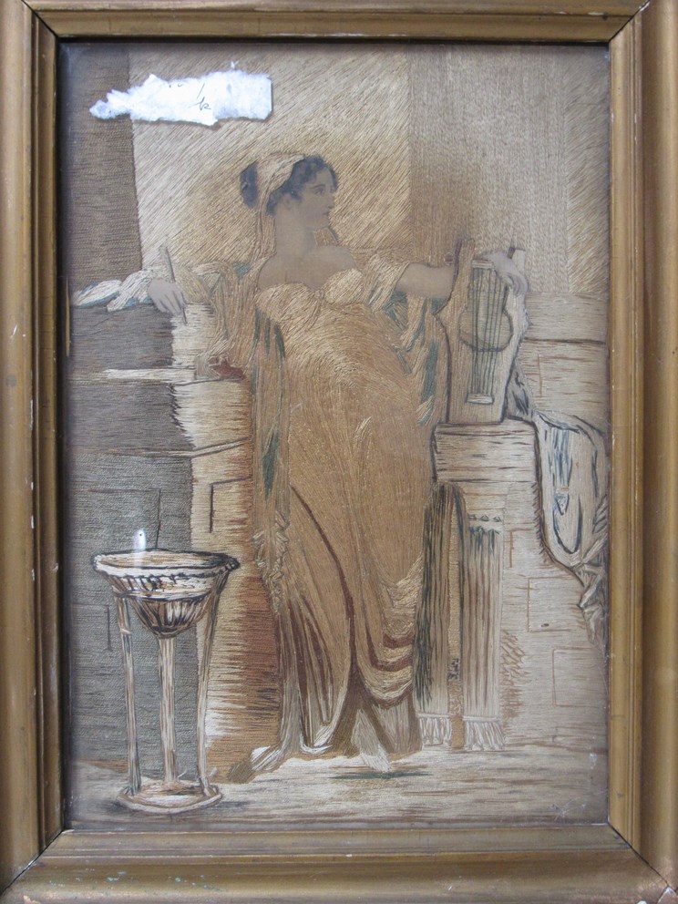 A 19th Century emboidery of a classical maiden with Lyre. Set in a gilt frame and glazed. 30. - Image 2 of 2