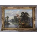 A. STONE (XX) A gilt framed oil on canvas, woodland lakes scene. Signed bottom left in red. 48.