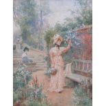 ALFRED GLENDING JNR (1861-1907): An ornate gilt framed watercolour of a young lady picking roses