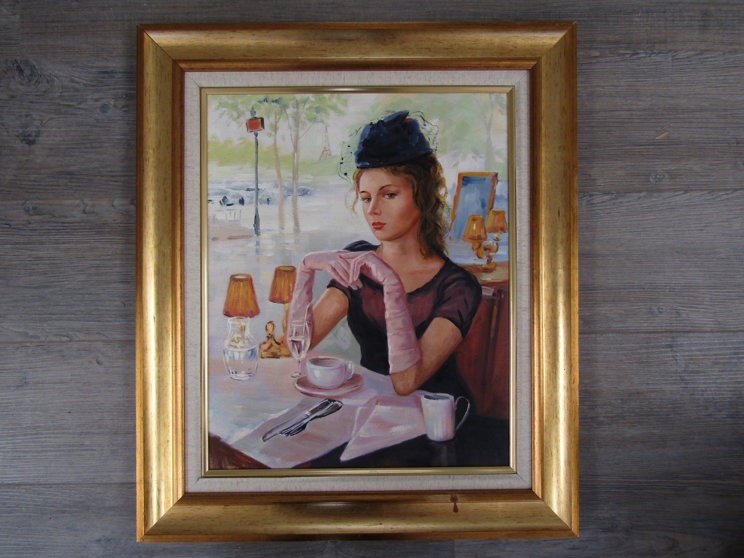 A late 20th Century oil on canvas portrait of a lady in a Parisian cafe. Unsigned work.