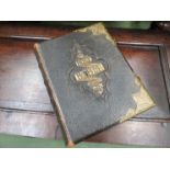 A Victorian leather bound Holy Bible, brass mounts and clasps,