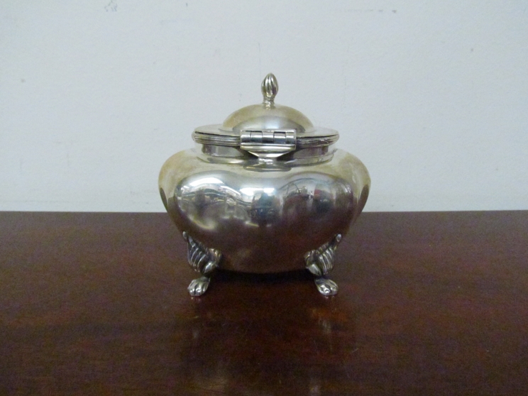 A miniature silver tea caddy of melon form raised on paw feet, - Image 2 of 3