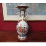 A Chinese export vase with twin handles,