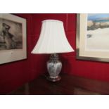 A pair of 20th Century Japanese style lamps with shades