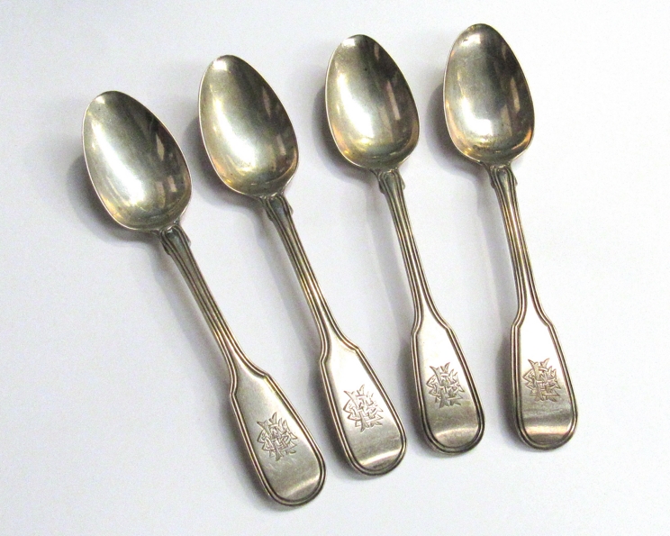 A set of four William Chawner silver teaspoons, lined border, monogrammed, London 1831,