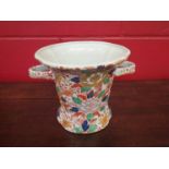 An Oriental twin handle vase, floral pattern,