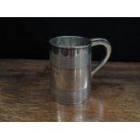 A George III silver tankard with lined detail, maker indistinct, London 1786,