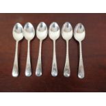 A set of six Cooper Bros and Sons silver coffee spoons with bright cut detail, Sheffield 1938,