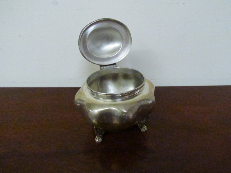 A miniature silver tea caddy of melon form raised on paw feet, - Image 3 of 3