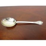 A Lambert & Co silver trefid spoon with rat-tail bowl, scrolled terminal,