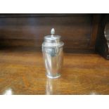 A James Garr of Aberdeen silver sugar sifter of deco form, dented top Birmingham 1936,