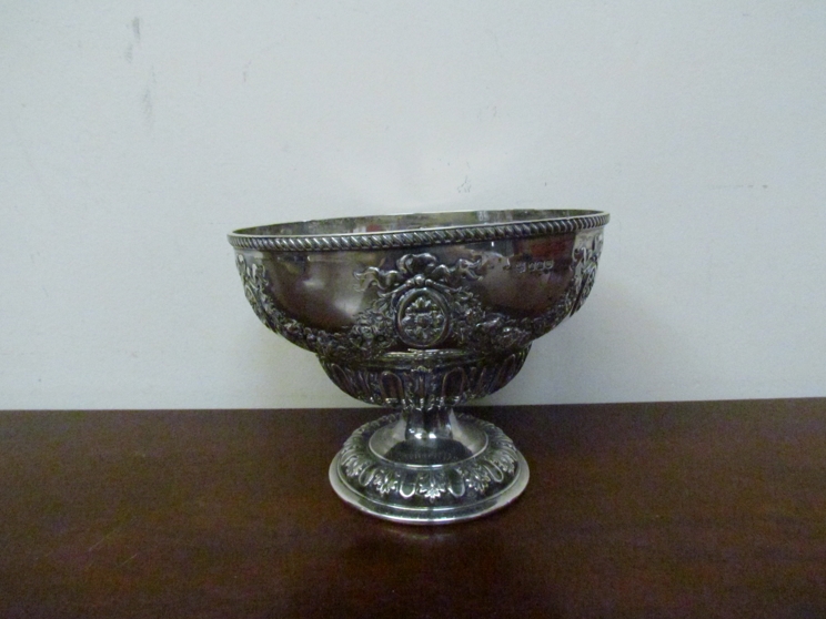 An Edwardian Fenton Brothers Ltd silver pedestal bowl with classical swag embossed detail,