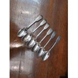 A set of six silver teaspoons.
