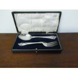 An Edwardian silver christening set consisting of spoon and fork,