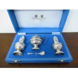 A Garrard and Co Ltd silver three piece cruet consisting of salt,